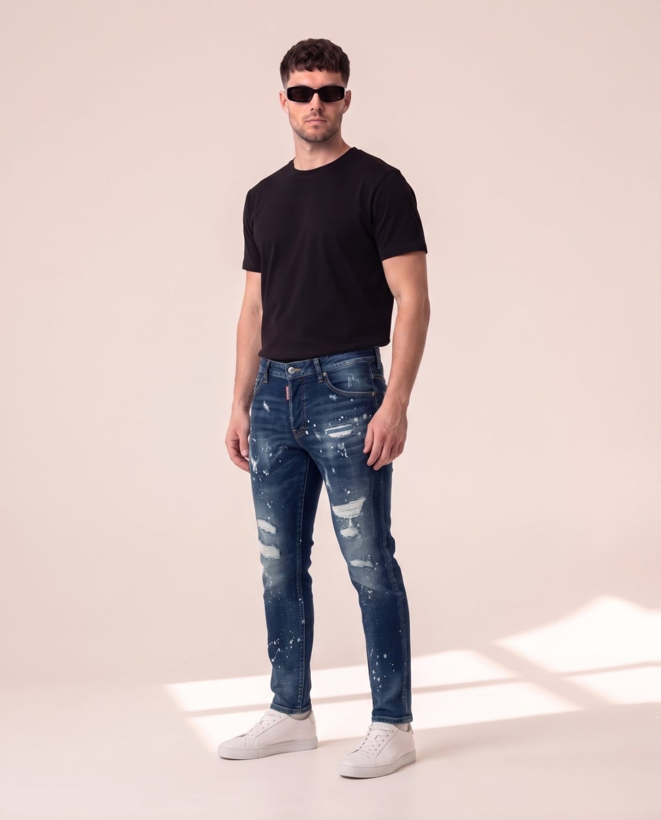 Dsquared2 modre kavbojke z raztrganinami in barvo