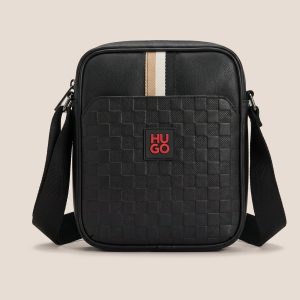Hugo torbica čez ramo iz monogramskega žakarja