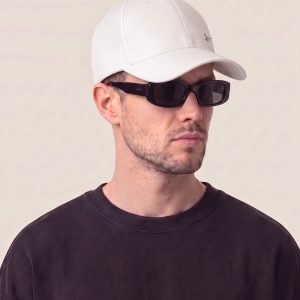 Nike kapa s šiltom v beli in mornarsko modri