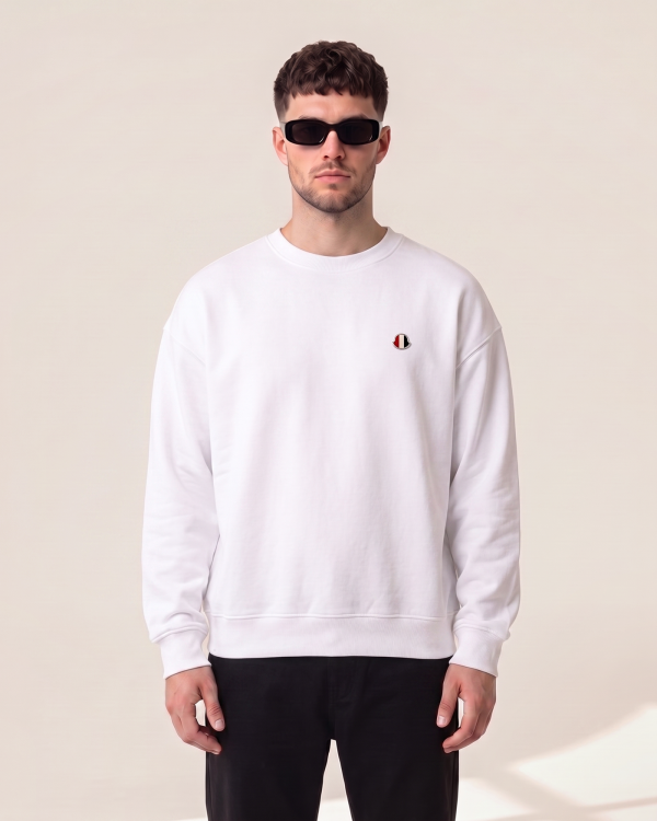Moncler pulover z našitim znakom