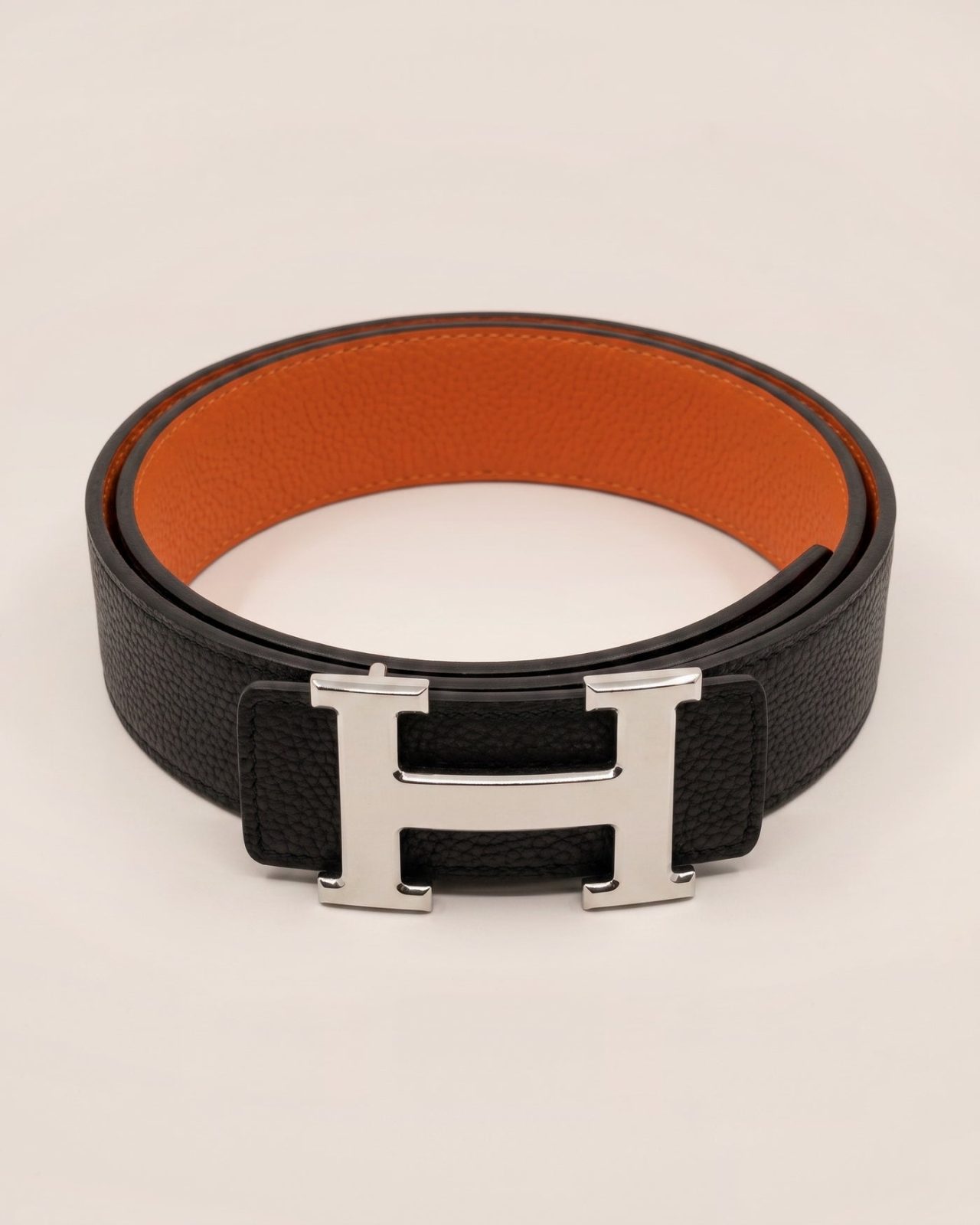 H5 – Hermès obojestranski pas črn / oranžen