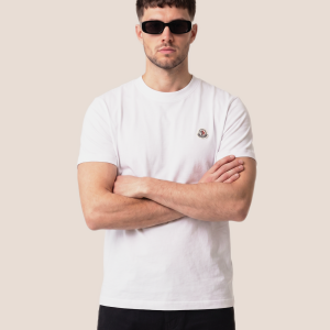 Moncler bela z okroglo značko
